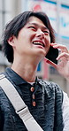 Happy, conversation and Asian man in city with phone call, travel outdoor and listen to feedback. Japanese person, mobile tech and contact in urban town with communication, hearing update or commute.