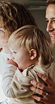 Baby, family and bonding with parents in home for holiday, free time or childhood development. Toddler, mom and dad with smile for weekend sightseeing, observation or perception together in house