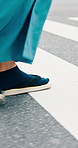 Japanese man, walk and shoes with crosswalk, traditional outfit and sandals for heritage or summer fashion. Person, zori and steps for trip, culture and travel with casual kimono or yukata in city