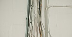 Infrastructure, electrical and data cables on wall for building network, fibre or renovation process. Construction, maintenance or technical installation of organized wiring, connectivity or ethernet