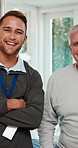 Laugh, caregiver and face with senior man in retirement home for assisted living or healthcare. Funny joke, nurse and portrait with patient for elderly care, support or trust in nursing house