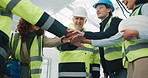Happy, architect and team with hands together for construction success, mission or achievement. Low angle, people or group of contractors piling with applause, high five or smile for celebration