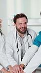 Doctor, hospital and hand stack with team, good news and motivation for surgery success. Smile, people and nurse in workplace with applause, collaboration and celebration for healthcare excellence