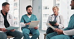 Nurse, meeting and doctors in office with document, patient charts and planning for treatment. People, team and talk in hospital with paperwork, medical records and case study for healthcare services