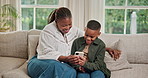Laugh, phone and mom with child on sofa for bonding with online game, internet and connection. Family, home and African mother and boy on cellphone for app, playing and relax together on weekend