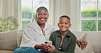 Face, phone and mom with boy on sofa for bonding with online game, internet and connection. Family, portrait and African mother and kid on cellphone for app, relationship and relax on weekend in home