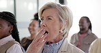 Yawn, seminar and businesswoman in office for meeting, presentation or conference with fatigue. Tired, bored and mature employee with team for training with exhaustion or burnout in workplace.