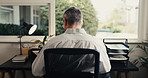Remote work, back and man in home office with project document, accounting report or tax evaluation. Mature person, freelance accountant and paperwork for bookkeeping, finance or audit information