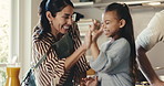 Mother, child and high five in kitchen with cooking success, bonding together and skill development. Happy, woman and daughter in family home with celebration, meal prep goals or learning for growth.