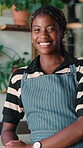 Hospitality, face and black woman in cafe with smile, barista career and pride as startup founder. Happy, confidence and small business owner with portrait, restaurant worker and about us in catering
