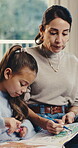 Mother, child and book for colouring in home for learning, development and art activity for bonding. Woman, daughter or happy girl kid with pencil for education, creativity and growth in family house