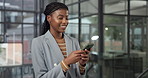 Smile, business and woman in office in phone, good news or positive feedback on story submission. Happy, female person and reading in workplace with mobile, copywriting report and publication funding