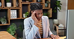 Tired, woman or headache in office with computer, financial crisis or stress for risk of liquidation. Exhausted, black person and typing in business with pc, migraine or worry for bankruptcy problem.