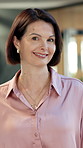 Face, corporate and woman in office with smile, career pride and real estate agent for about us. Portrait, mature person or happy in workplace with experience, realtor consultant and property auction