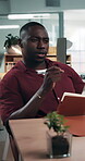 Review, thinking or black man in office with notebook, campaign plan or idea for creative pitch. Brainstorming, reflection or brand clerk with pen, ad insight or problem solving on marketing proposal