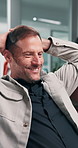 Break, relax and business man in office for productivity, complete project or happy to finish target. Smile, mature person or rest at work with easy task, coworking or stretching for deadline freedom