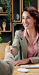 Handshake, meeting and happy with business woman in office for interview, job opportunity and candidate. Hr onboarding, recruitment and shaking hands with mature employee in agency for vacancy offer