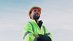 Construction, thinking or man outdoor with hardhat, progress plan or mindset in project renovation. Below, space or engineer with ppe, industrial perspective or operation reflection in remodeling.