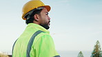 Construction, thinking or man on balcony with ppe, progress plan or mindset in property renovation. Building, space or engineer with review, project perspective or operation reflection in remodeling.