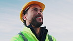 Construction, thinking or man outdoor with helmet, progress plan or mindset in property renovation. Building, space or engineer with hardhat, project perspective or operation reflection in remodeling