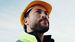 Construction, thinking or man outdoor with review, progress plan or mindset in industrial evaluation. Space, below or engineer with hardhat, project perspective or operation reflection on development