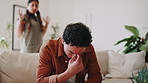 Fight, couple and man in house with frustration, disagreement and conflict in toxic relationship. Argument, fatigue and people in lounge with issue, tension and partner confrontation in marriage.