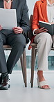 Row, hiring and business people in office with documents, tablet and waiting for job opportunity. Corporate, recruitment and workers in lobby for onboarding, interview process and career application