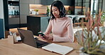 Phone, laptop and texting with woman in home for banking update, account review and contact. Tax research, online budget and audit balance with person and tech for planning and finance management