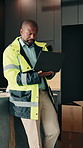 Thinking, black man and engineer at new house with laptop, research or ideas for architecture. Mature person, inspection or pc for evaluation, quality control and information for property development