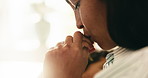 Kiss, mom and child holding hands in home for safety, parenting and support in living room. Love, mother and kid with bonding together at house for trust, development and guidance or security
