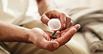 Pills, medicine and hands of person on sofa for medical prescription, supplements and drugs. Health, wellness and antibiotics with man in living room of home for medication, recovery and vitamins