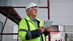 Tablet, man and construction worker on site with planning for maintenance, repairs or remodeling. Technology, thinking and mature civil contractor with feedback on property development or renovation.