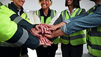 Architect, people and hand stack for construction, motivation and celebration for completed project. Smile, team and huddle at site with applause, partnership and achievement for building development