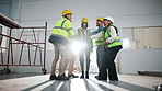 People, engineer and hand stack for construction, motivation and celebration for project success. Smile, team and lens flare at site with applause, partnership and achievement of building development