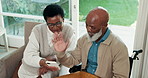 Old couple, wave and video call in home with phone, wheelchair and online communication on weekend. Happy, black man with a disability and woman with digital tech, contact or virtual conversation