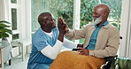 Happy, caregiver and old man high five with wheelchair for health improvement, motivation and help. Nurse, celebration and senior black person with disability, healing and encouragement in home.