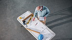 Architecture, above and man with blueprint, clipboard and check layout for construction project. Contractor, engineer and mature person with paperwork for planning, renovation design and remodeling