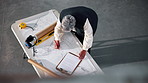 Architecture, above and woman with blueprint, clipboard and building layout for construction project. Contractor, documents and mature person with design for planning, renovation and remodeling