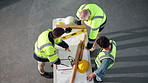 Architecture, above and people with blueprint for planning, renovation and building project. Collaboration, meeting and men with drawing, floorplan or layout for construction, expansion or remodeling