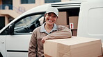 Logistics, face and courier in town with box, delivery driver and confidence in distribution. Portrait, happy and woman outdoor with package, dispatch profession and about us in supply chain industry