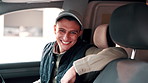 Face, driver and happy delivery man in van with shipping, distribution or pride for ecommerce job. Male person, smile or courier service in vehicle for transport, supply chain or logistics for import