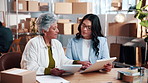 Clipboard, discussion and women in office with tablet for logistics, distribution or information. Conversation, digital technology and supply chain managers with checklist for cargo in workplace.