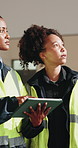 Construction, tablet or team on site with review, progress track or feedback on evaluation. Inspection, women or engineers with tech, quality control or partner assessment in building development.
