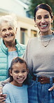 Face, smile and love with family outdoor for property investment, bonding and support. Generation, happy and new home with grandmother and child with parent in backyard of house for care and weekend