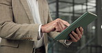Tablet, hands and man in workplace for business, investment portfolio or risk assessment at night. Overtime, corporate and person with tech in office, private equity and scroll financial email