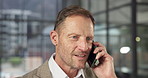 Business, phone call and man in agency with smile, funding advice and networking in online chat. Happy, digital or mature finance advisor with tech, investment guide or discussion in client contact.