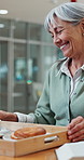 Senior, food and happy woman with serving in nursing home for catering service or breakfast. Elderly, female person or smile with wooden tray or book for meal, snack time or hospitality in retirement