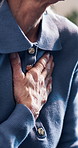 Hands, old woman and chest in home with discomfort, lung disease and symptoms of asthma. Unwell, senior person and airway irritation at house with viral infection, bronchitis and breathing difficulty