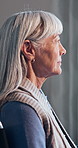 Sad, thinking and elderly woman in wheelchair with nostalgia, memories and worry for dementia. Nursing home, retirement and senior person with disability for thoughtful, remember and Alzheimers