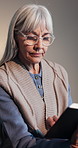 Bible, reading and senior woman in wheelchair for religion, worship or spiritual wellness in bedroom. Glasses, praise and elderly person with disability studying holy scripture for guidance in home.